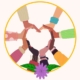 spirit of community gathering hands forming heart